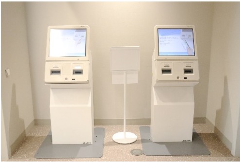 自動再来受付機